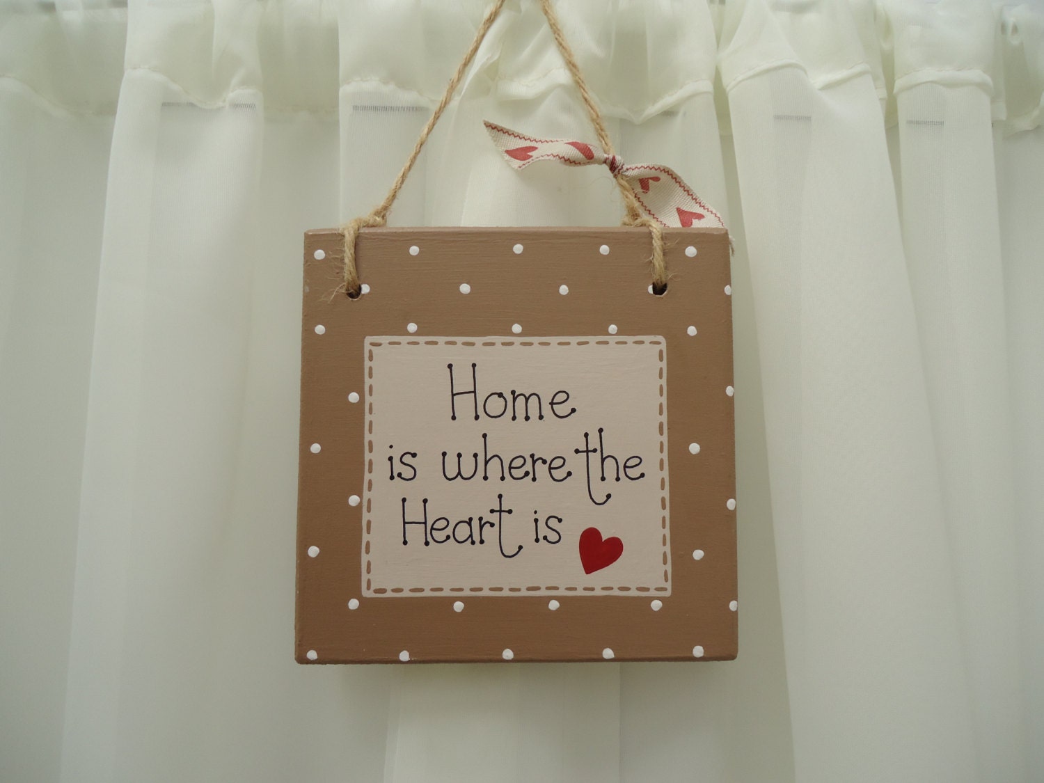 Handmade 'Home is where the heart is' wooden plaque