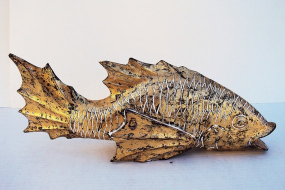 large wooden fish sculpture