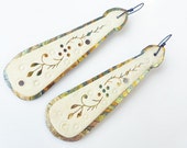 Miracles. Cosmic rustic assemblage earrings with carved bone and gold leafed tin.