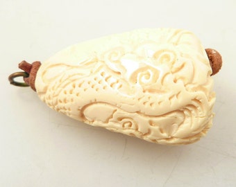 SALE --- Antique Chinese Carved Bone Mystical Dragon Pendant