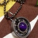 Upcycled roller derby bearing pendant