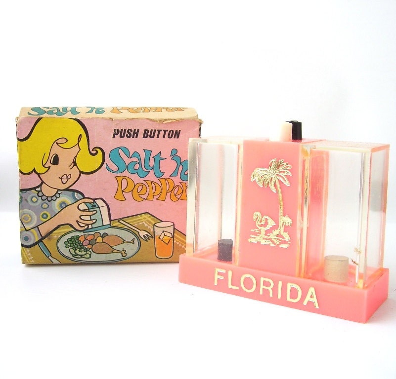 vintage pink salt and pepper shakers original box florida push