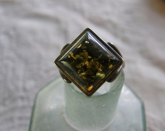 Vintage sterling silver and faux green amber ring