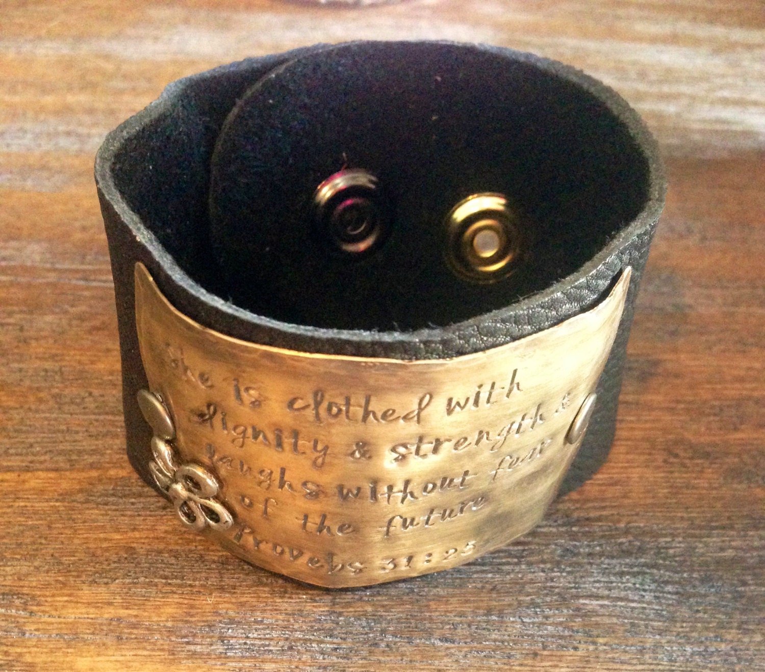 Hand Stamped Leather cuff bracelet...silver flower on