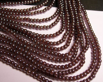 Crystal - round - 4mm ( 4.4mm) - prune - full strand - 82 beads - pearlized - P6A