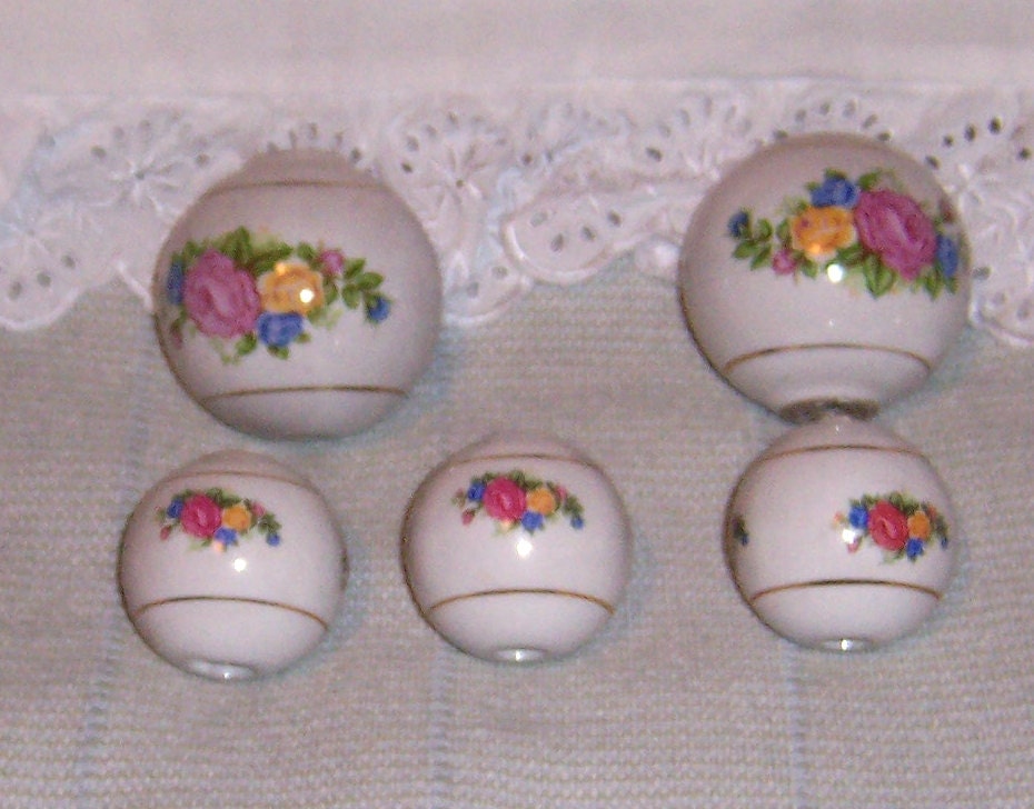 5 porcelain balls from brass bed with 5 top caps lovely