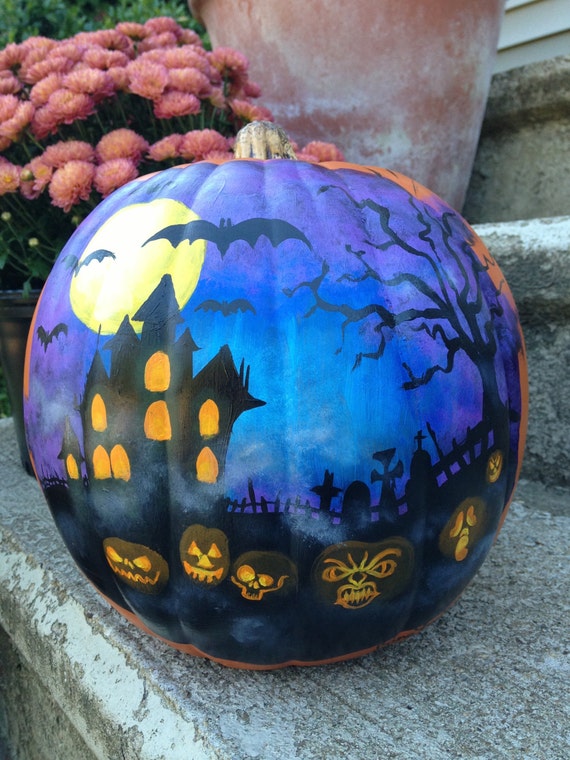 Items similar to Painted Plastic Pumpkin with Haunted 