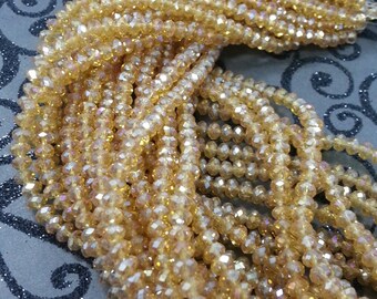 Chinese Crystal. 4 mm Rondelle Topaz AB Color.
