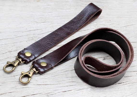 Soil brown leather neck strap and wristlet trap