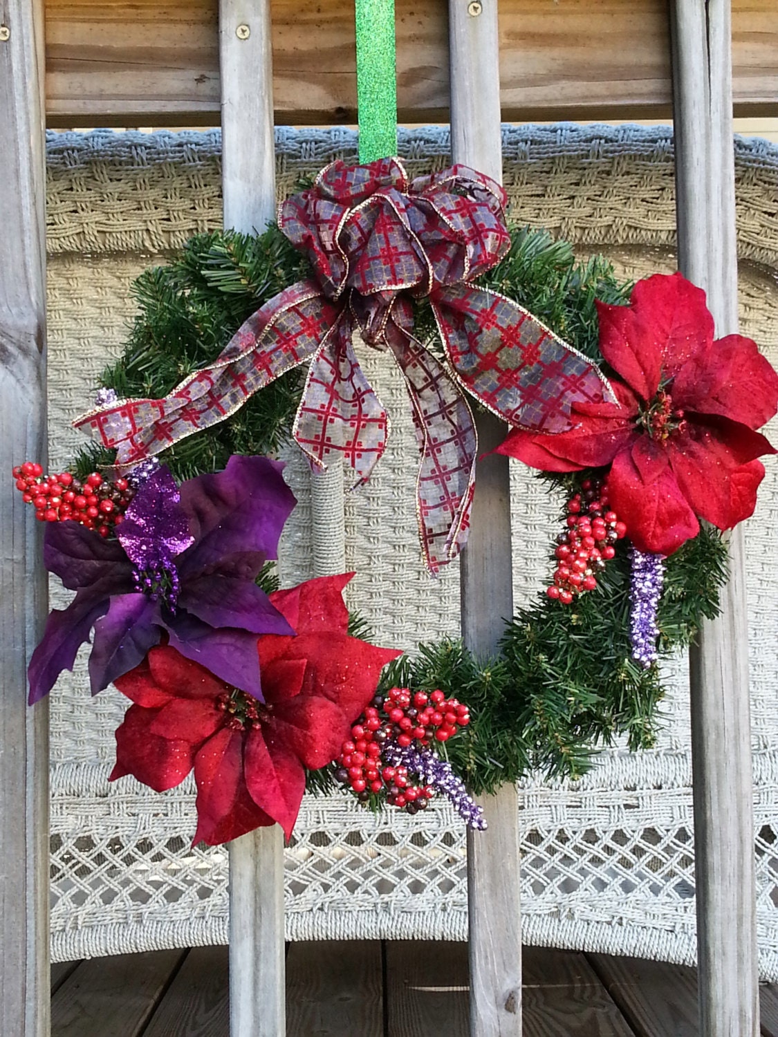 Red and purple poinsettia wreath