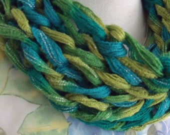 Col in green tones with silver gakure