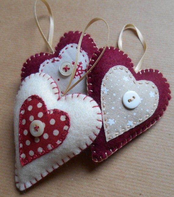 Items similar to Set of three heart-shaped felt christmas decorations ...