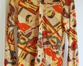 Late '70s, picnic scene, novelty print, men's body shirt, fall/autumn tones. Size S for men, M for women. Late '70s, picnic scene, novelty print, men's body shirt, fall/autumn tones. Size S for men, M for women.