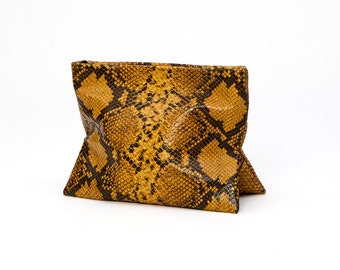 black and yellow clutch