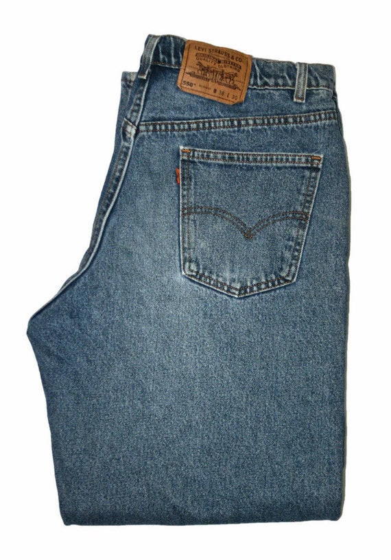 Vintage Levis 550 Relaxed Fit Orange Tab Jeans by VintageMensGoods