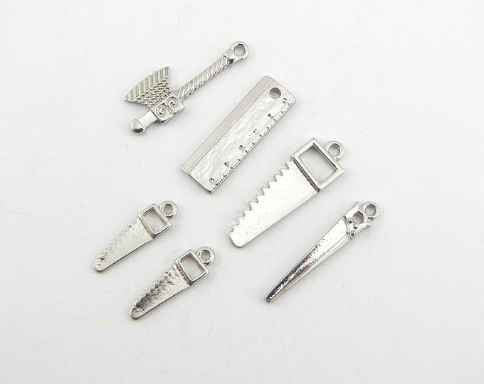 Set of Tool Charms, Saws, Axe, Ruler Silver-tone