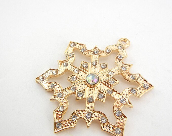 Large Cut-Out Gold-tone Rhinestone Accented Snowflake Pendant Aurora Borealis Center