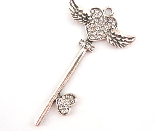 Silver-tone Skeleton Key Pendant with Winged Heart