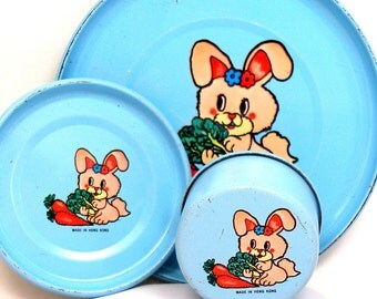 Lil Bunny Tin Toy Tea Setting, 3 piece set. Pink bunny on blue background.