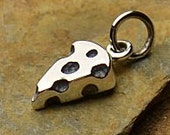 Sterling Silver Cheese Charm.Length 15.5mm  Width 6mm  Height 2.6mm...Who Cut the Cheese