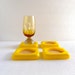 Mid century modern design mod yellow coaster set - rain coat yellow w/ cork - 1970s Palm Springs Jonathan Adler chic - Mad Men Mod bar needs