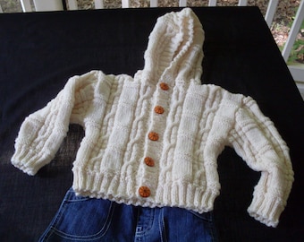 Hand knit baby boy or girl cream colored hoodie cardigan