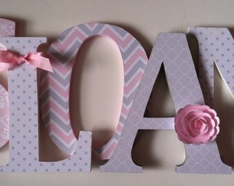 Alphabet wooden letters for nursery in pink and white