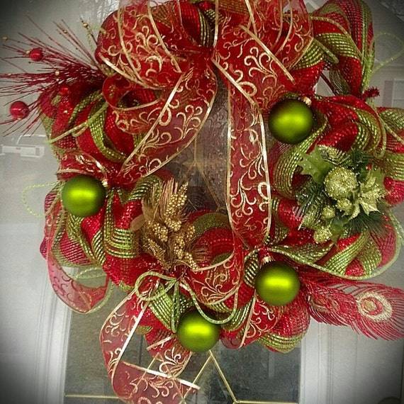 Items similar to Christmas wreath made with red, green and gold on Etsy