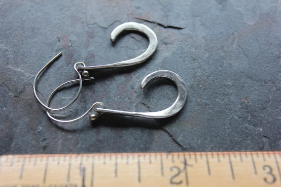 Items similar to sculpted silver hooks on Etsy