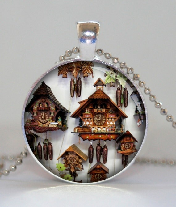 Items similar to cuckoo clock pendant charm SWISS cuckoo clock necklace