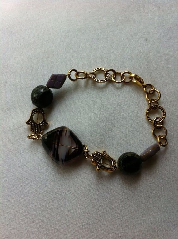Items similar to Crystal purple marble with gold chain bracelet on Etsy
