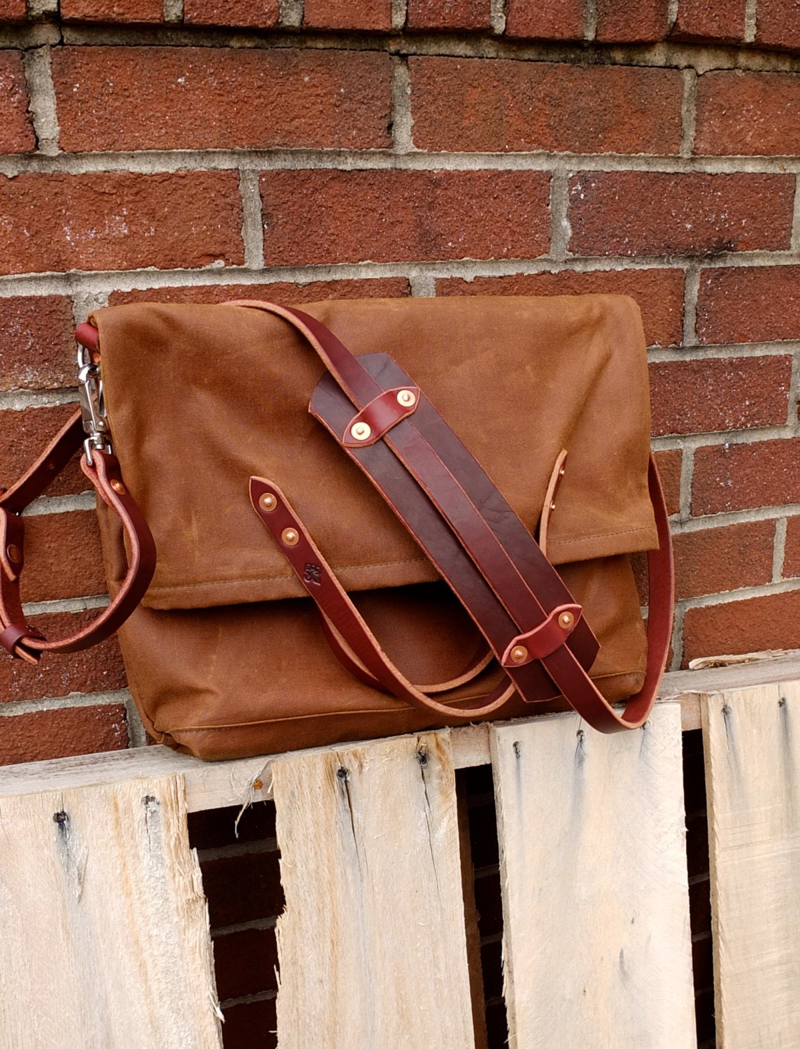 Waxed Canvas Foldover Messenger Bagas seen in SOUTHERN LIVING