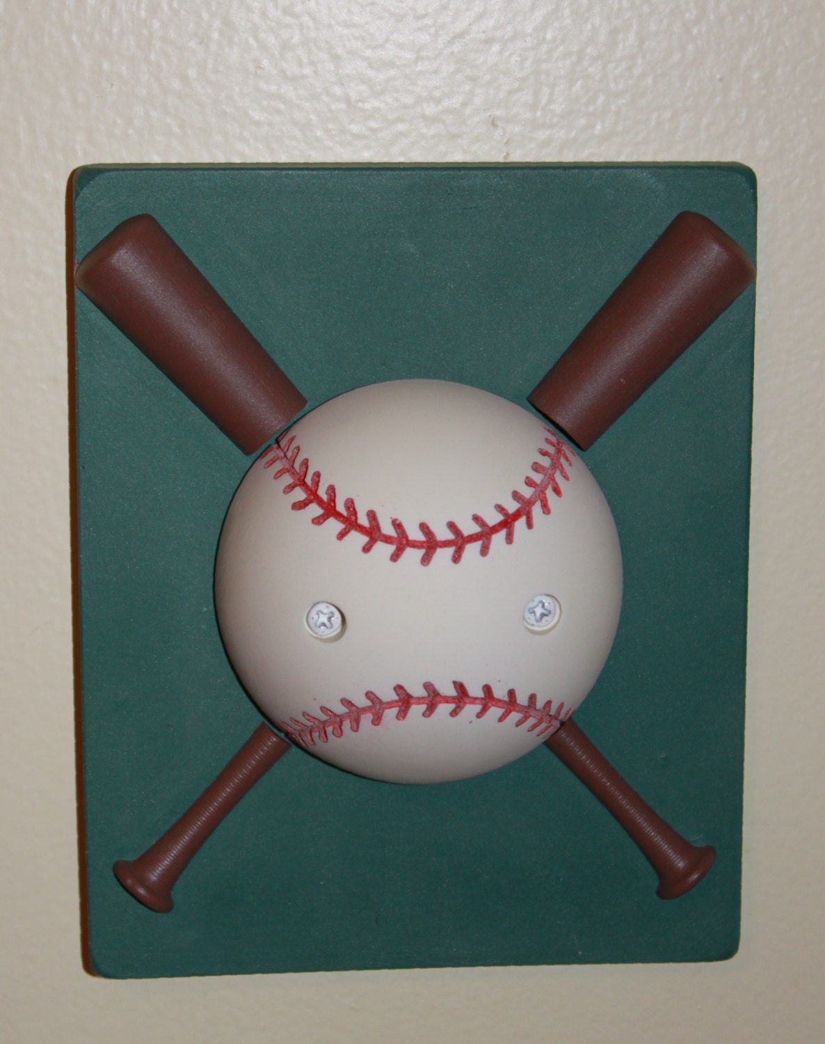 baseball light switch cover with rotating ball