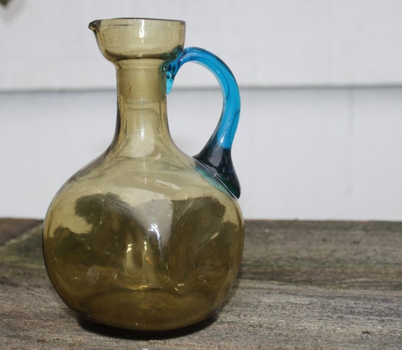 Vintage UNUSUAL Glass Pitcher Bottle Green with Blue Handle