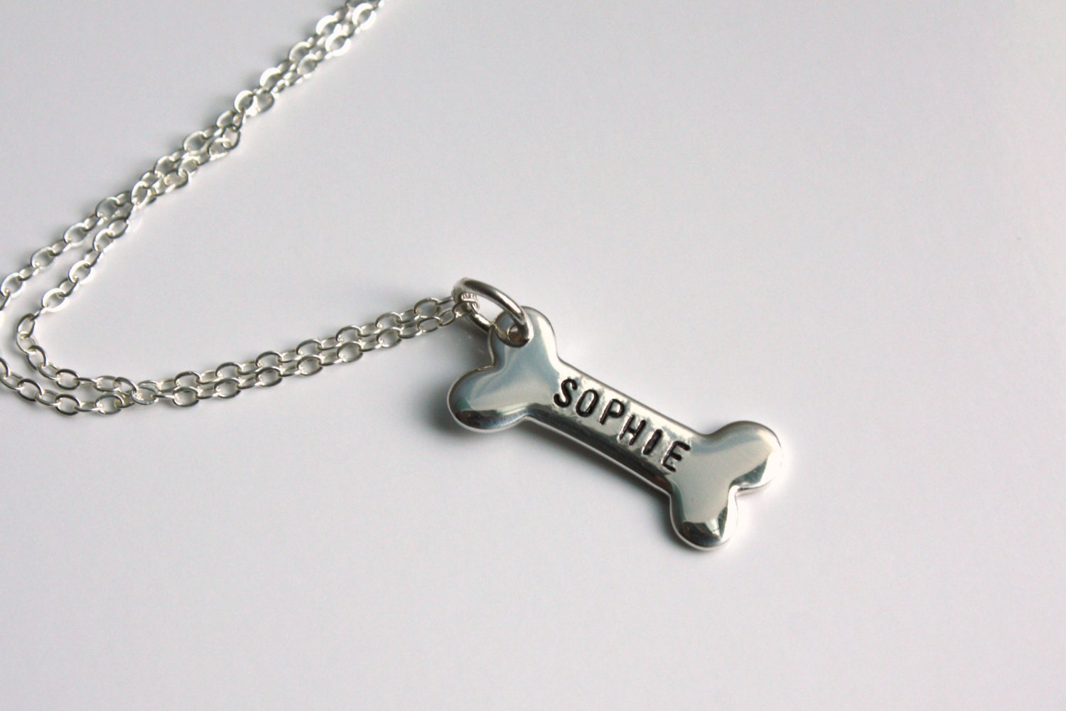 Sterling Silver Dog Bone Necklace With Stamped Pet Name on