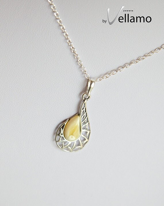 Yellow milky natural amber pendant from Estonia by byVellamo