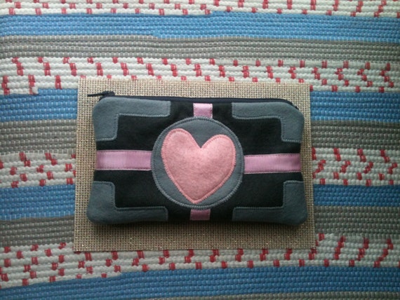 https://www.etsy.com/uk/listing/166424287/companion-cube-felt-applique-purse