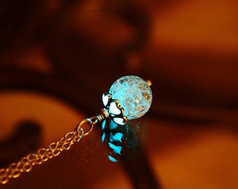 Cracked clear round crystal pendant GLOW in the DARK