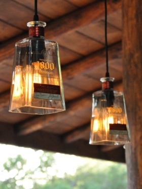 Recycled 1800 Tequila Bottle Pendant Lamp with old fashioned light bulb