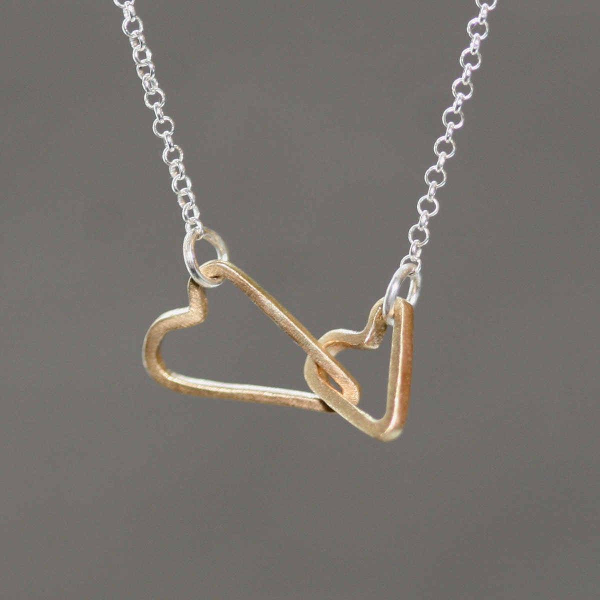Double Sideways Heart Necklace in 14k Gold and Sterling Silver