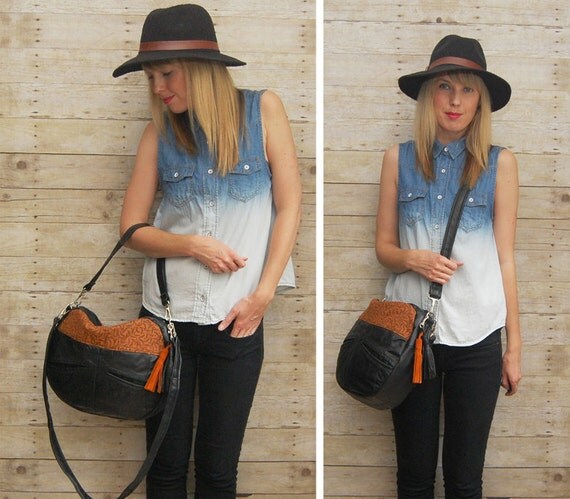 The TUNDRA Leather Bag /// slouchy black leather bag with orange arrow fabric and tassel