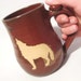 Howling Wolf Coffee Mug, Tea Cup - Handmade Pottery Bare Brown Clay Wild Animal Silhouette Against Rustic Rust Red