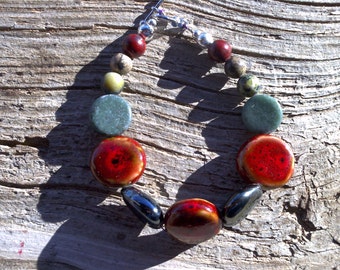 Glass,porcelan,misc. stone beaded bracelet 8 inch