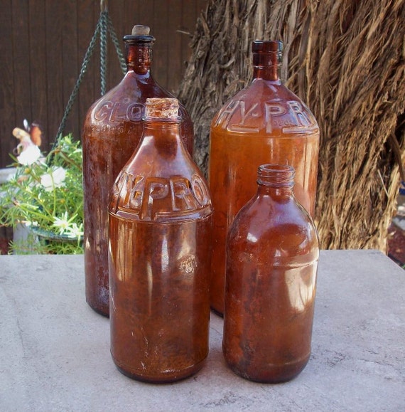 Vintage Rustic Amber Glass Clorox Bottle and Amber Glass Hy-Pro Bottles  Circa 1940