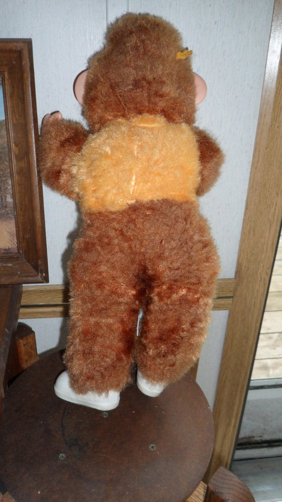 1970 stuffed monkey with banana