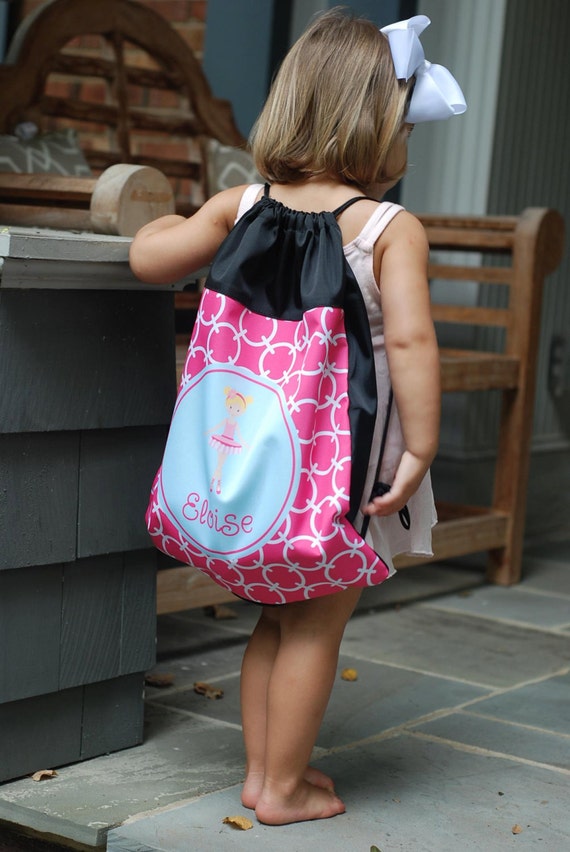 toddler wearing backpack