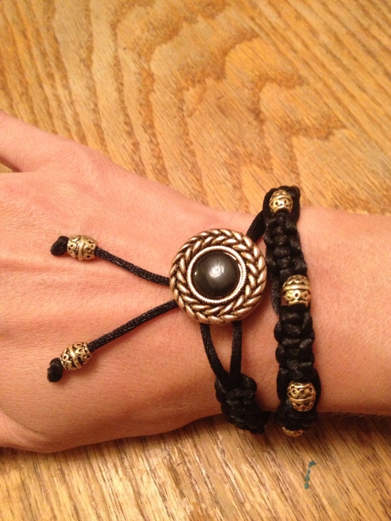 Items similar to Black & gold adjustable wrap bracelet on Etsy