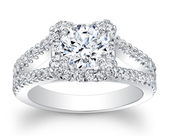 Ladies 18kt white gold diamond engagement ring with round