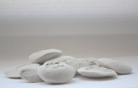 Stoneware Royal porcelain pebble with an imprint of by madebymanos