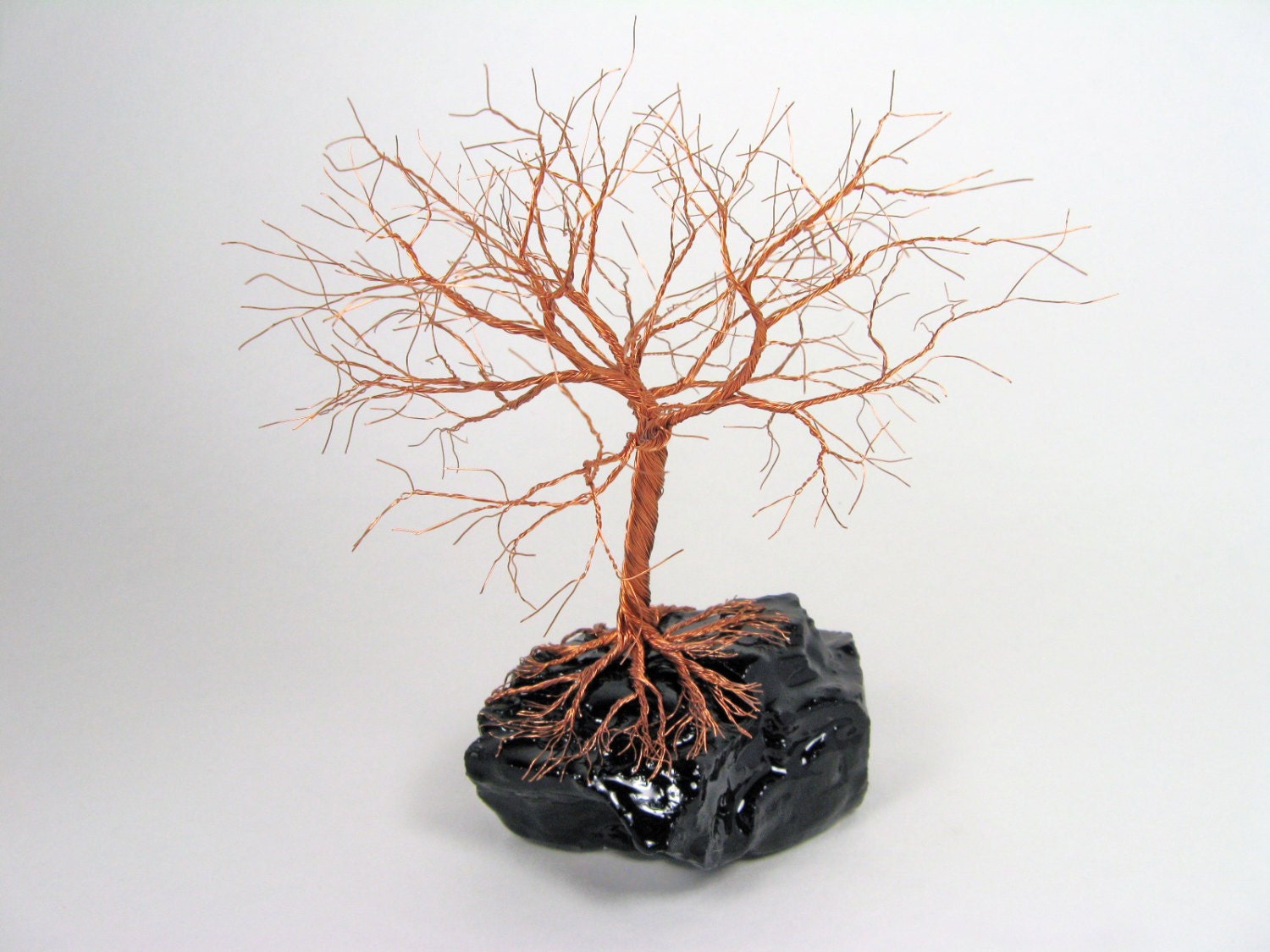 Copper and Coal A twisted wire tree sculpture.